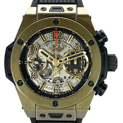 Hublot Big Bang UNICO 42 Herrenuhr mit schwarzem Armband und goldener Umrandung, zeigt Uhrwerkdetails