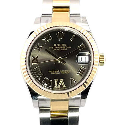 Rolex Datejust 31 Oystersteel Gelbgold Damenuhr mit schwarzem Zifferblatt.