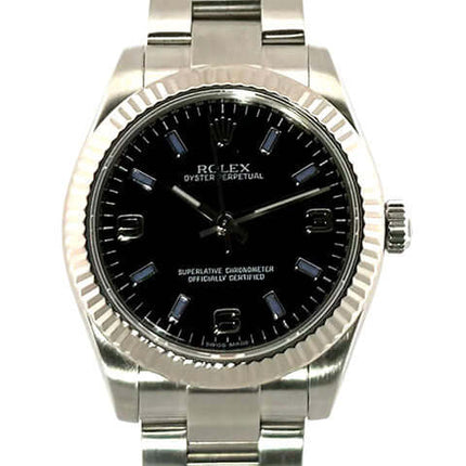 Rolex Oyster Perpetual 31 Ref. 177234 Schwarz, Edelstahlgehäuse, Weißgold Lünette, schwarzes Zifferblatt, silbernes Edelstahlband