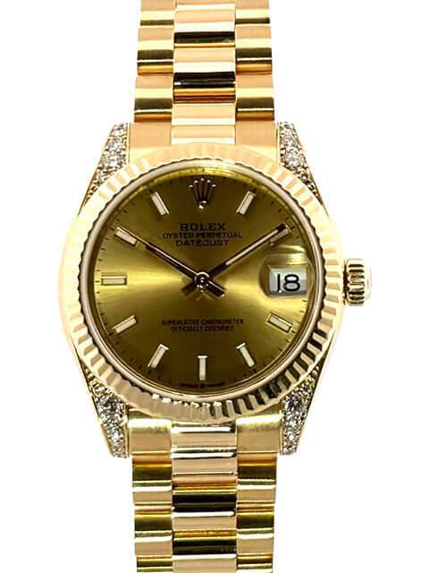 Rolex Datejust 31 Gelbgold 178238 Champagner Zifferblatt Uhr mit 18 kt Gelbgold Armband und geriffelter Lünette.