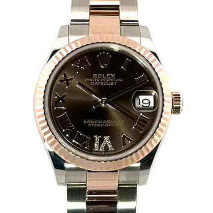 Rolex Datejust 31 Oystersteel Everose-Gold Ref. 278271 mit braunem Zifferblatt, römischen Ziffern und Diamant bei VI, poliert und satiniert.