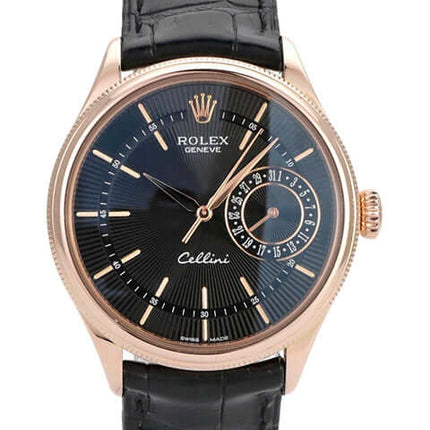 Rolex Cellini Date Ref. 50515 mit schwarzem Zifferblatt und 18 kt Everose-Gold-Gehäuse auf schwarzem Lederarmband.