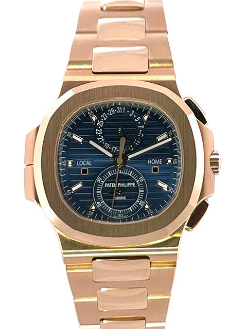 Patek Philippe Nautilus 5990/1R-001 Travel Time Roségold Uhr mit blauem Zifferblatt und 18 kt Roségold Armband