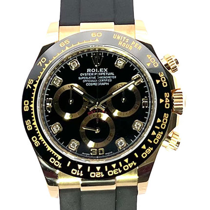 Rolex Daytona 116518LN Gelbgold mit schwarzem Diamantzifferblatt und Oysterflex-Band.