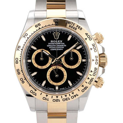 Rolex Daytona Edelstahl und Gelbgold 126503 mit schwarzem Zifferblatt und Tachymeterskala, poliert und satiniert.