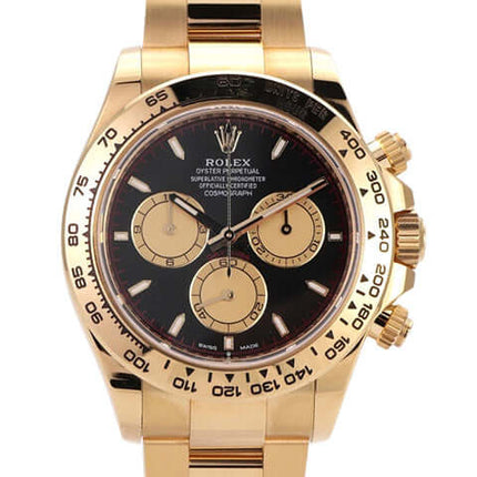 Rolex Daytona Gelbgold 126508 mit schwarzem Zifferblatt und champagnerfarbenen Totalisatoren.