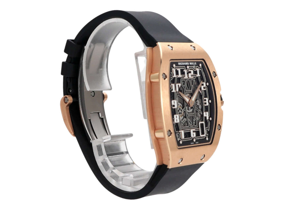 Richard Mille RM67-01 Extra Flat Rose Gold, schwarzes Kautschukband, transparentes Zifferblatt, elegantes Design.