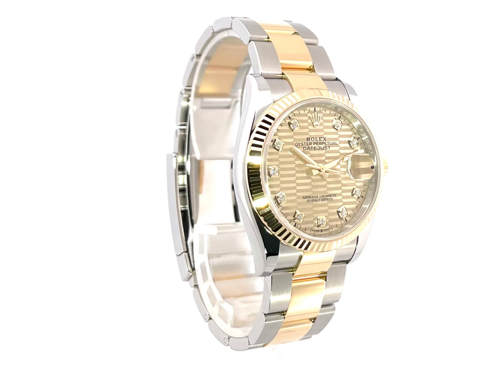 Rolex Datejust 36 Oystersteel Gelbgold 126233 mit goldenem Riffelmuster und Diamanten, Edelstahl/Gelbgold Gehäuse und Oyster-Armband.